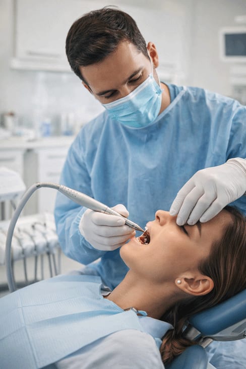Careful root canal treatment being carried out
